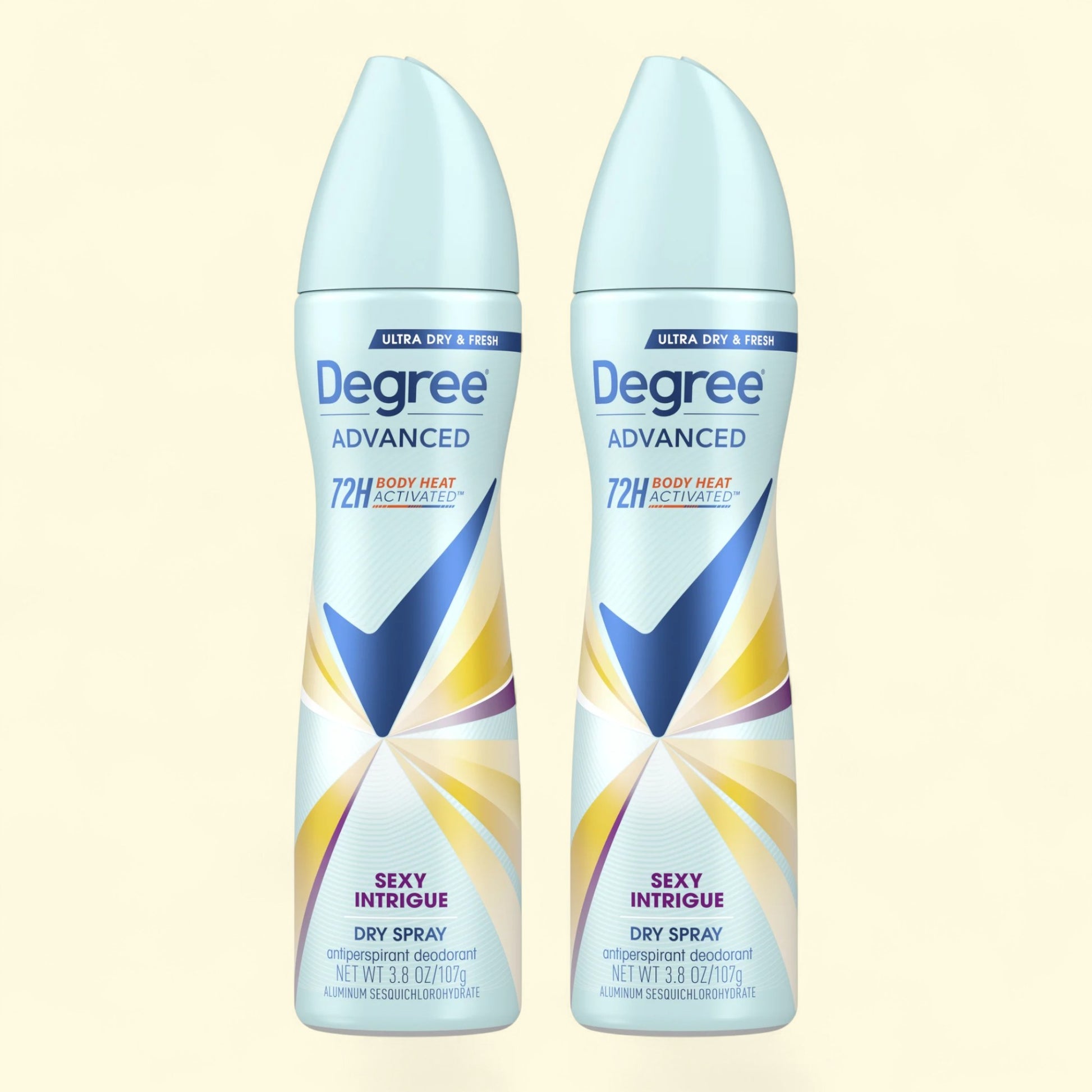 Two bottles of Degree Advanced Sexy Intrigue dry spray on a beige background