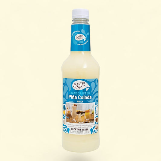 Bottle of Master Mixer Pina Colada mixer on a light beige background
