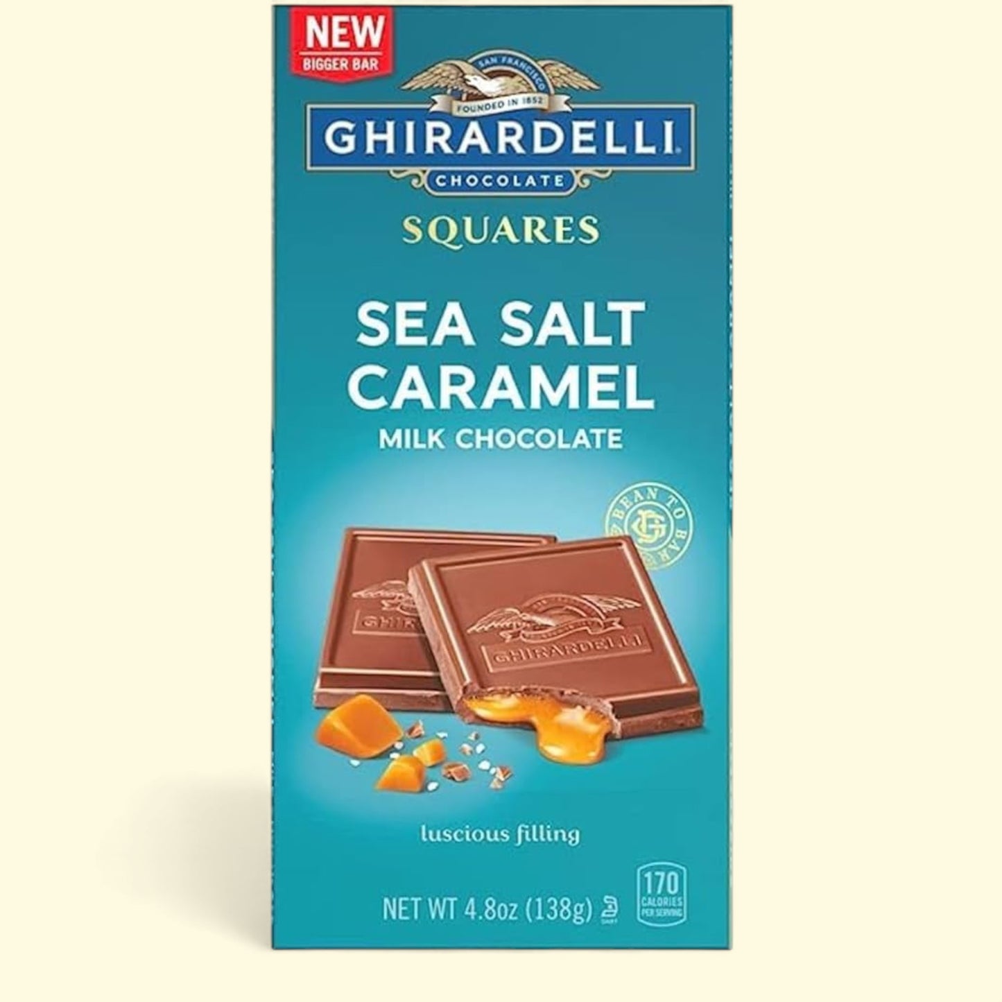 Ghirardelli Sea Salt Caramel milk chocolate packaging on a beige background