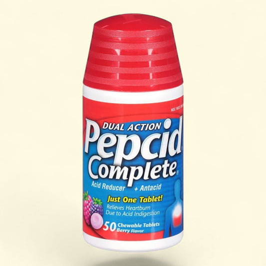 Pepcid Complete dual action acid reducer and antacid bottle on a beige background