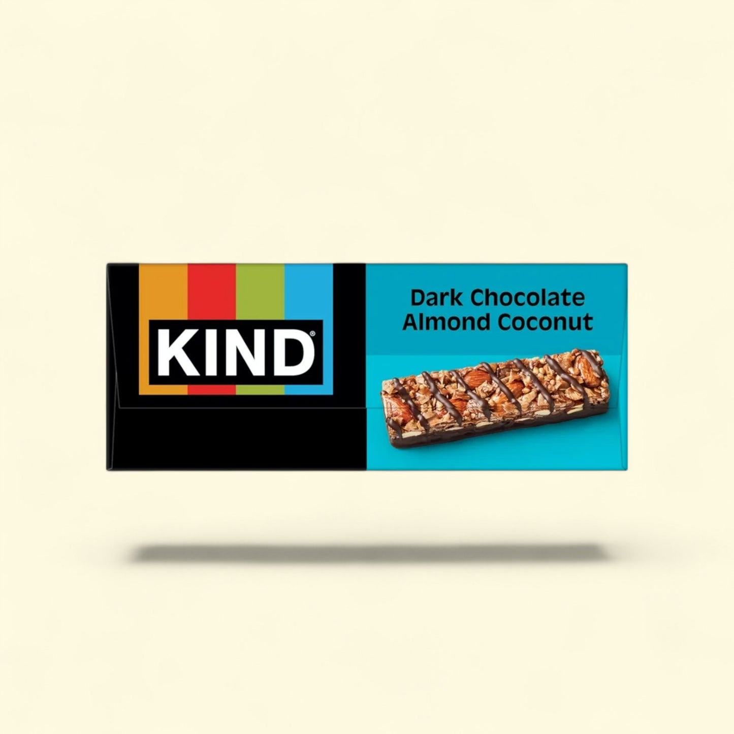 Kind Dark Chocolate Almond Coconut bar packaging on a beige background