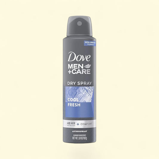 Dove Men+Care dry spray antiperspirant on a beige background