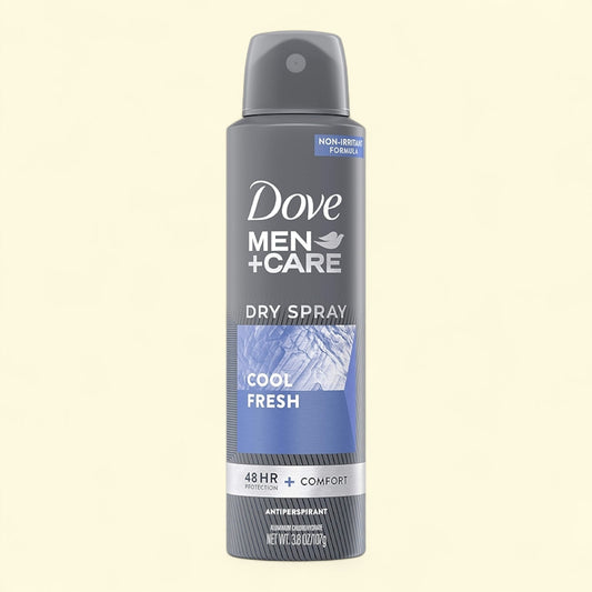 Dove Men+Care dry spray antiperspirant on a beige background