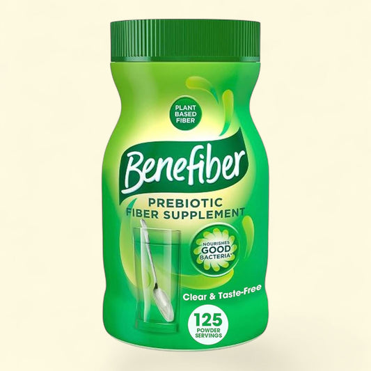 Green bottle of Benefiber prebiotic fiber supplement on a beige background