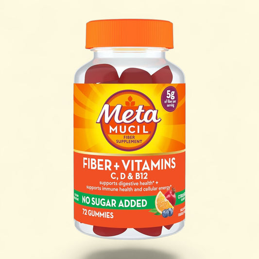 Meta Mucil fiber supplement gummies bottle with orange cap on a beige background