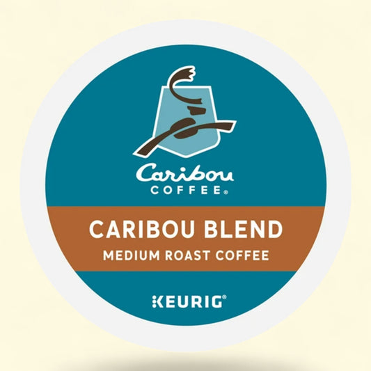 Caribou Coffee Caribou Blend medium roast Keurig coffee pod on a beige background