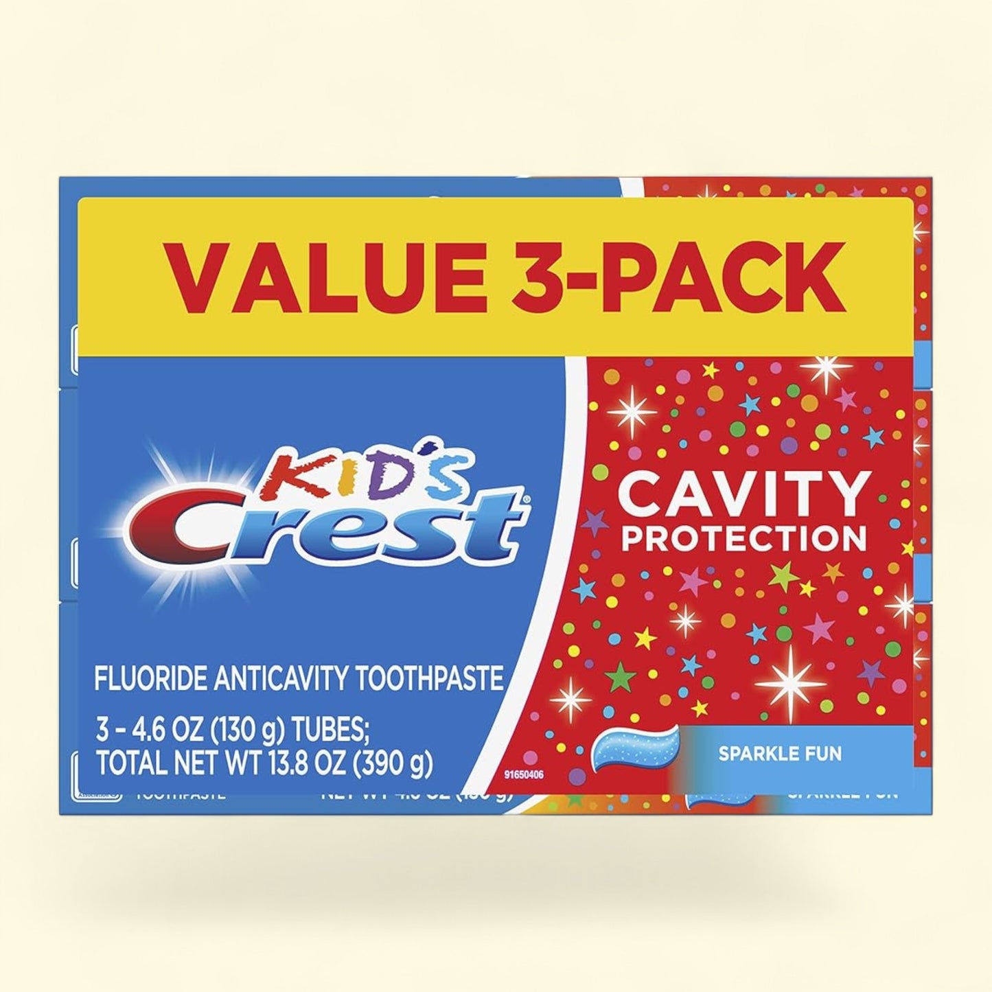 Crest Kids' toothpaste value pack on a beige background