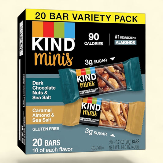 KIND minis dark chocolate nuts and sea salt caramel almond and sea salt variety pack on a light beige background