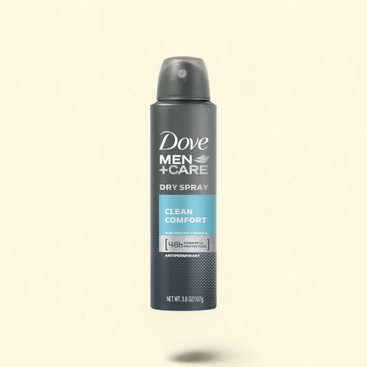Dove Men+Care dry spray antiperspirant on a beige background