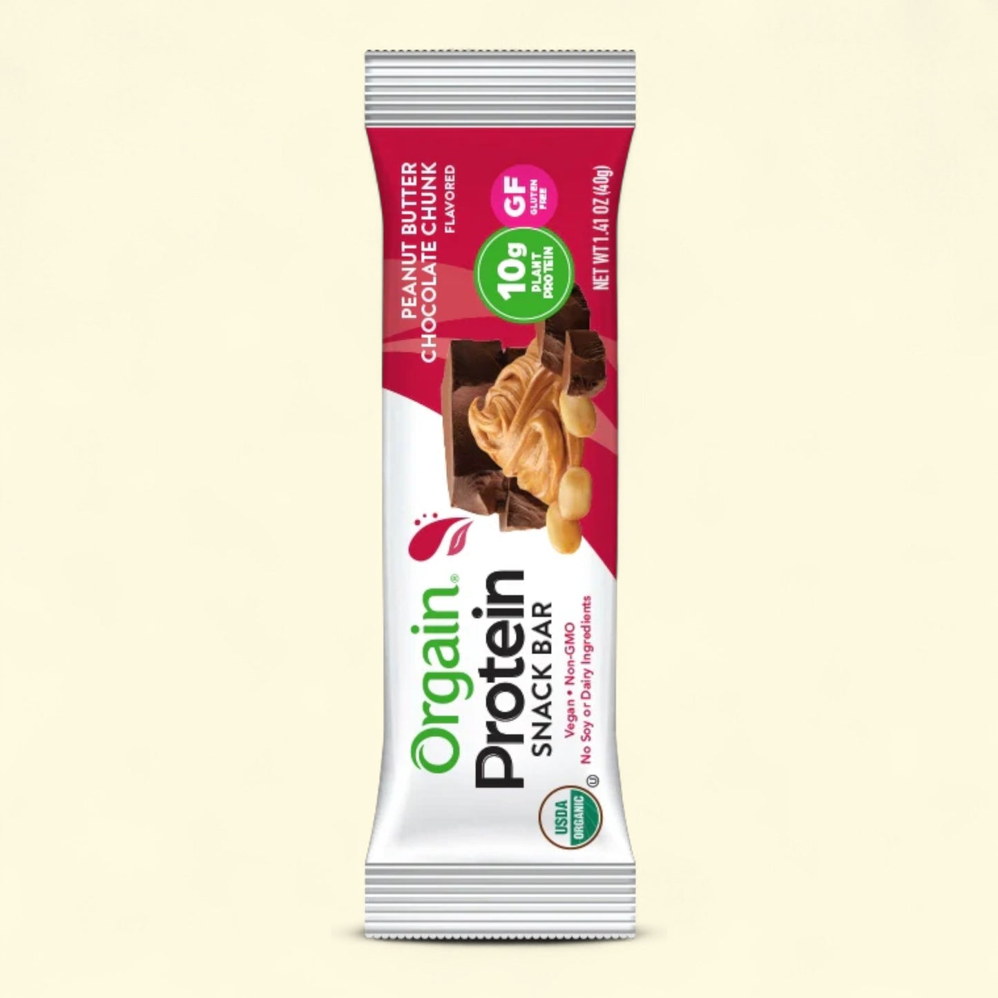 Orgain protein snack bar peanut butter choclate chunk packaging on a beige background