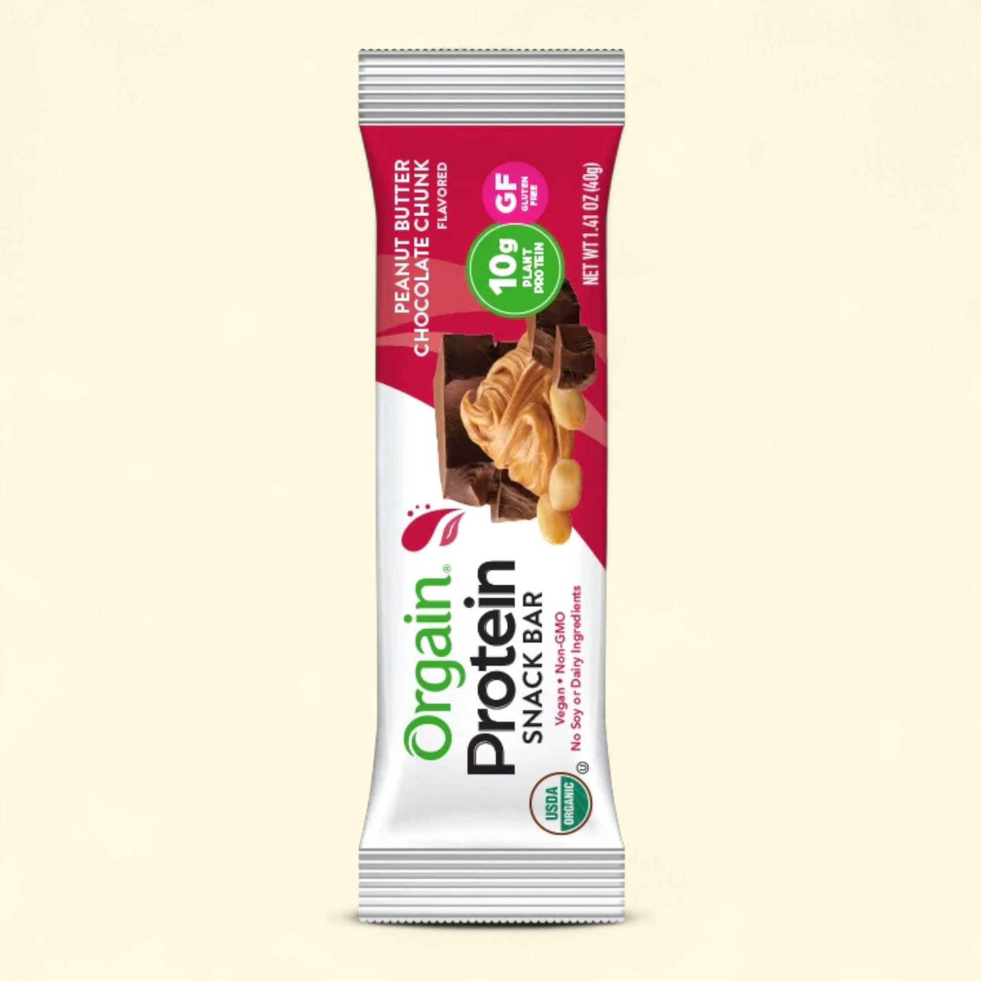 Orgain protein snack bar peanut butter choclate chunk packaging on a beige background