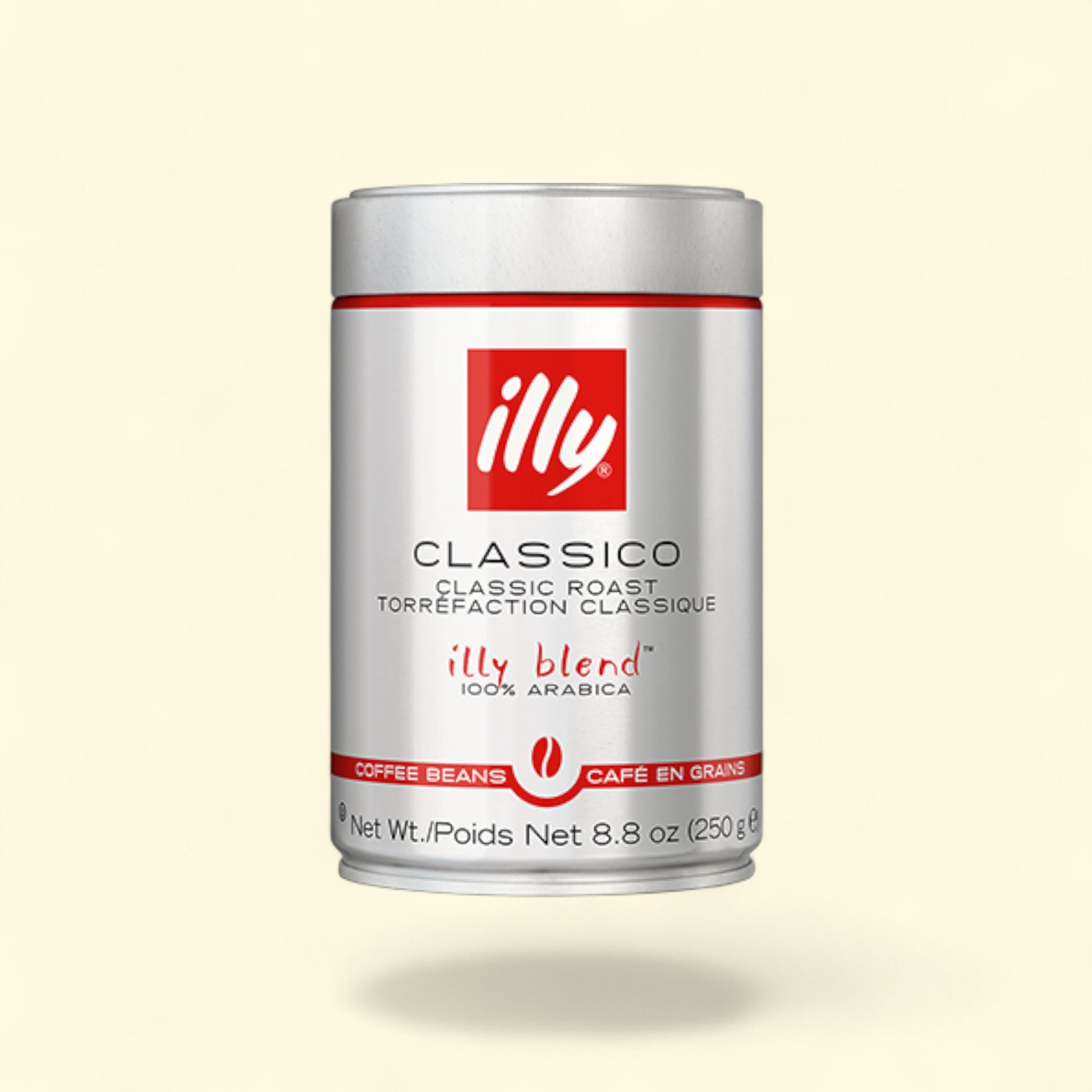 Illy Classico coffee beans canister on a light beige background