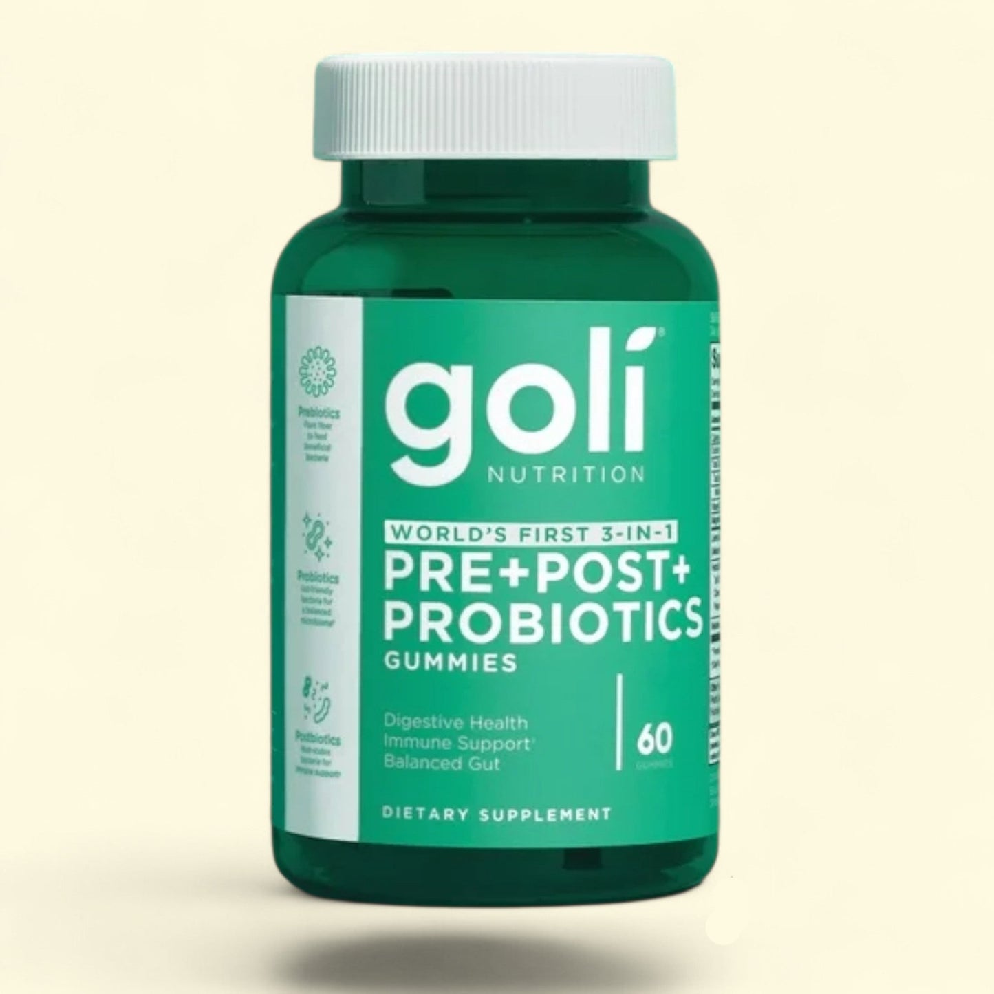 Green bottle of Goli Nutrition pre+post+ probiotics gummies on a beige background