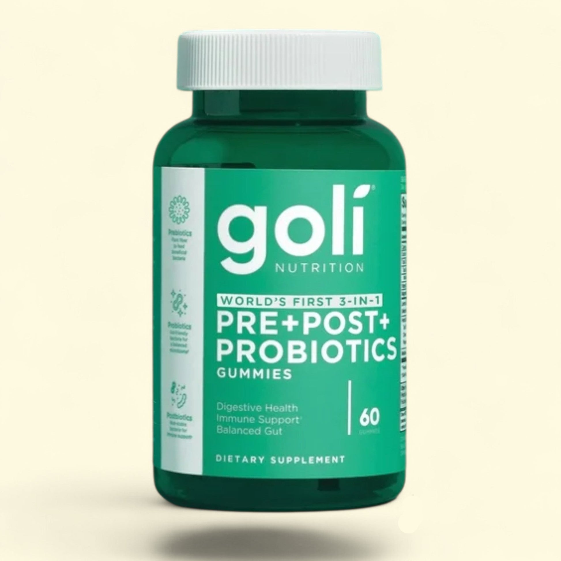 Green bottle of Goli Nutrition pre+post+ probiotics gummies on a beige background