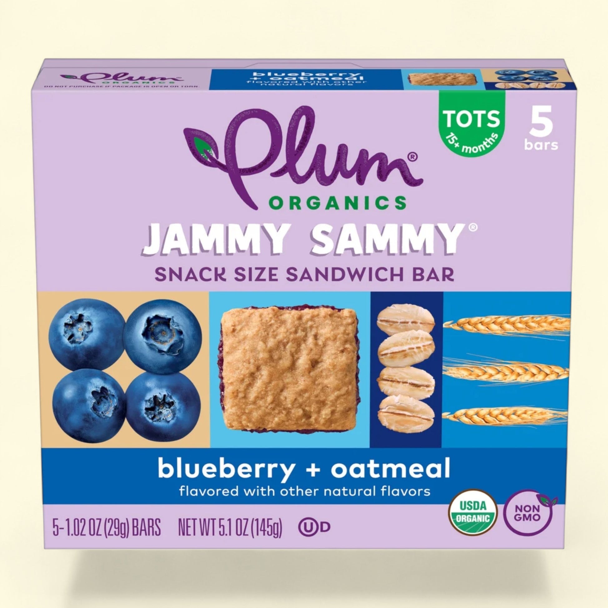Plum Organics Jammy Sammy snack size sandwich bars with blueberries and oatmeal on a light beige background