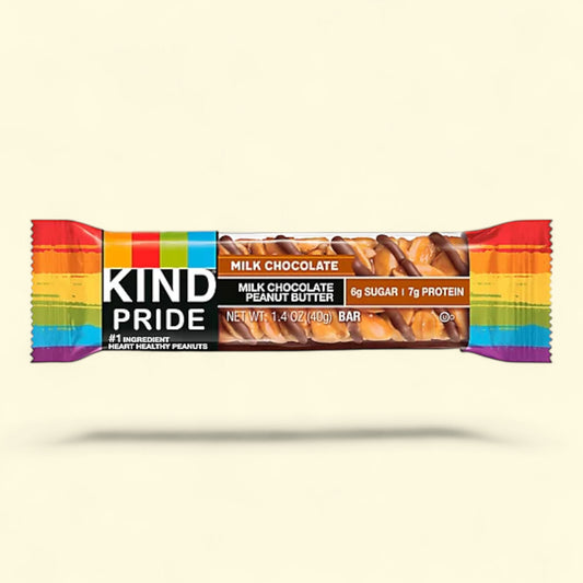 Kind Pride milk chocolate peanut butter bar with rainbow wrapper on a beige background