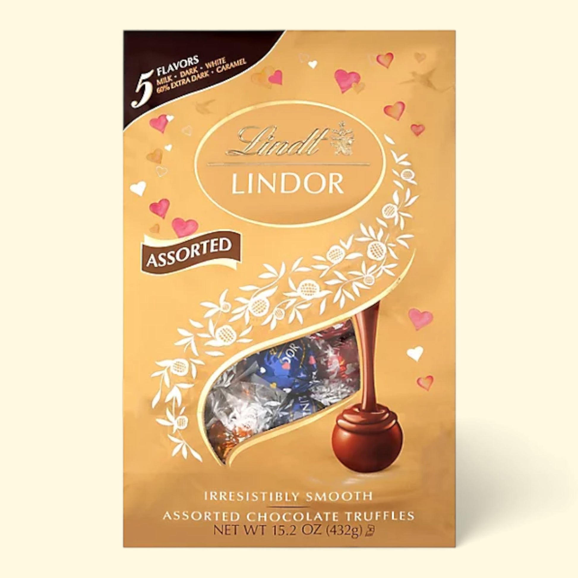 Lindt Lindor assorted chocolate truffles packaging on a beige background