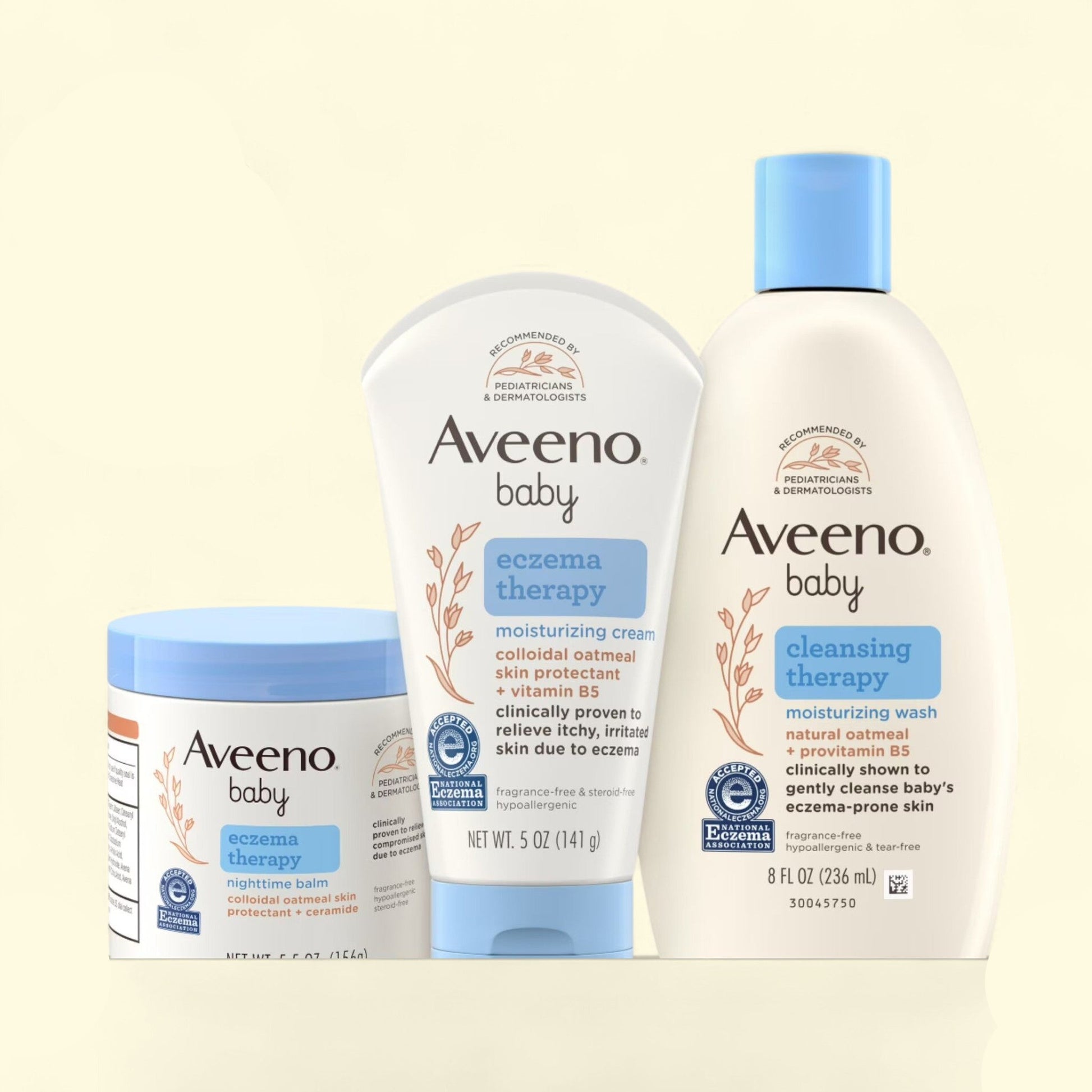 Aveeno baby skincare products including cream, lotion, and balm on a beige background