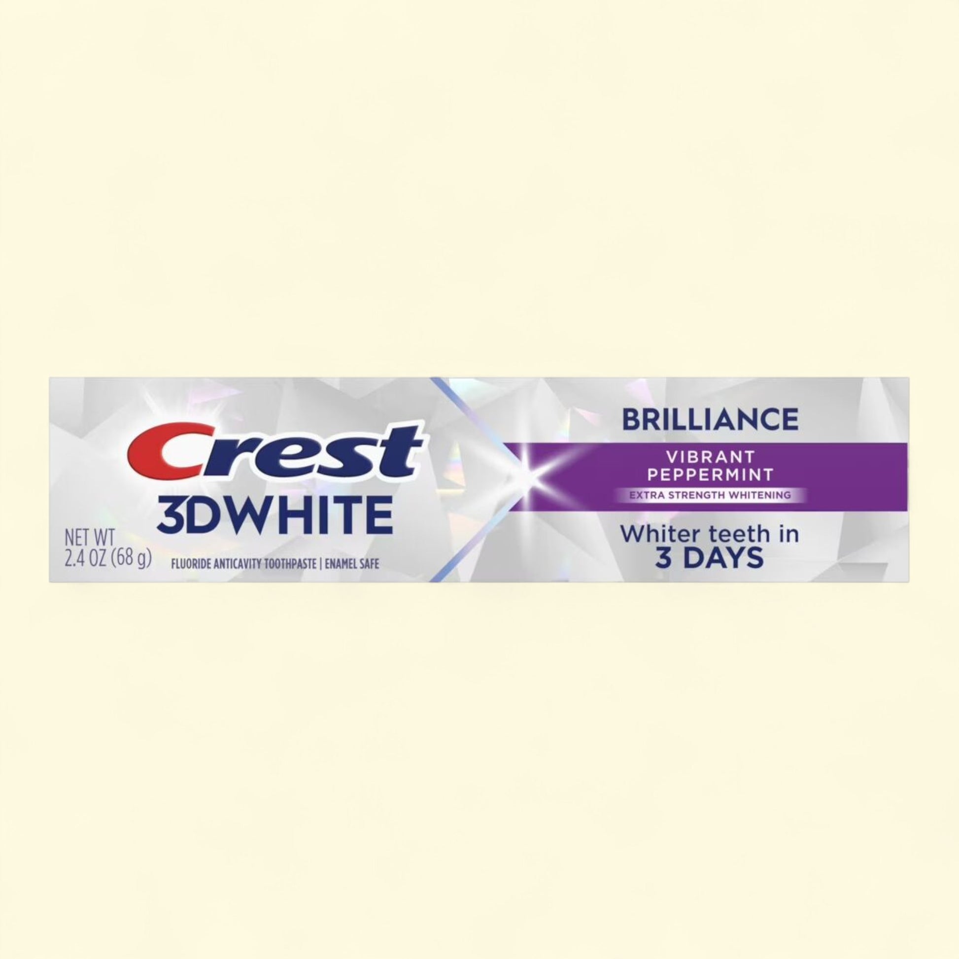 Crest 3D White toothpaste tube on a beige background