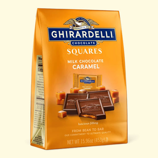 Ghirardelli chocolate squares bag with milk chocolate caramel flavor on a beige background