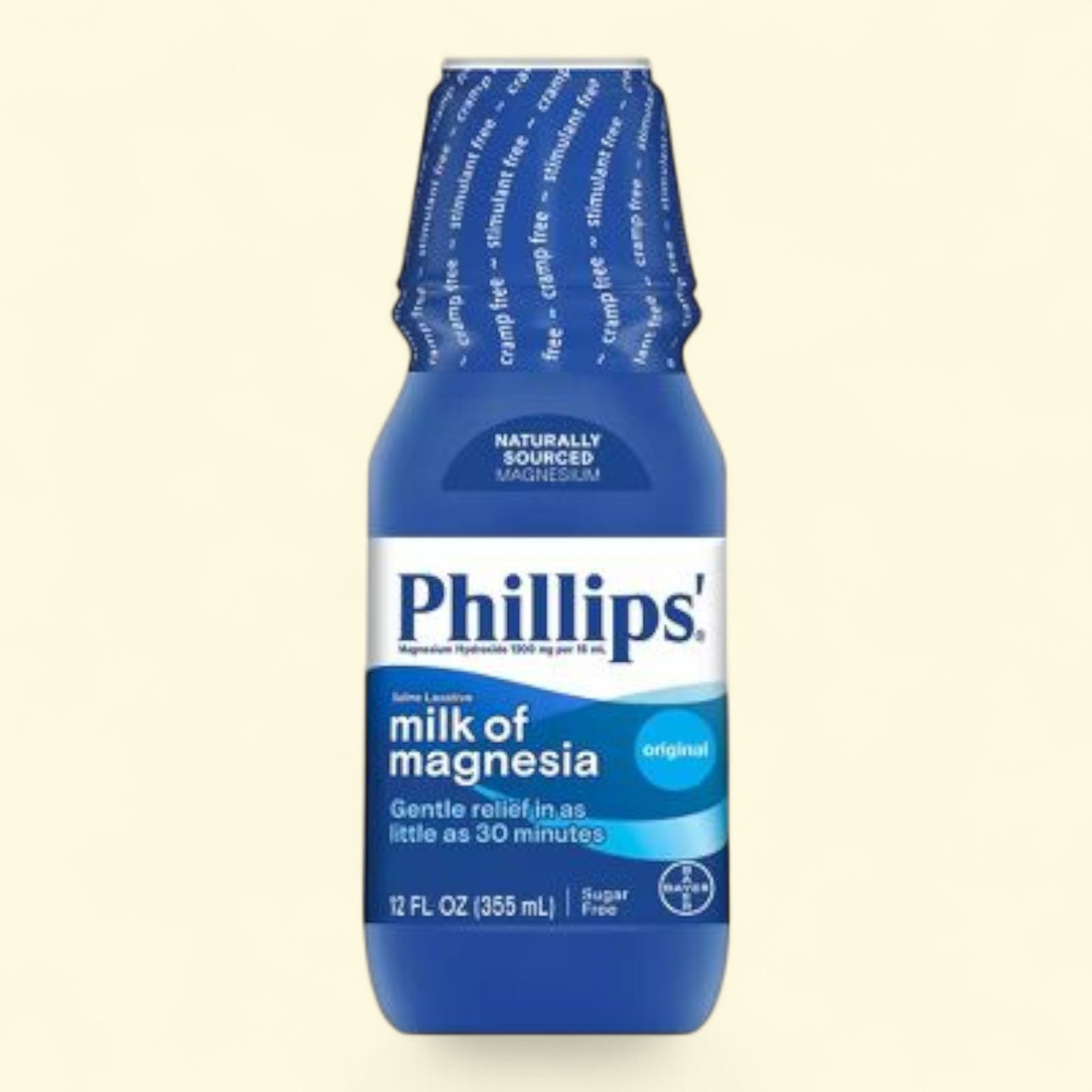 Phillips' Milk of Magnesia bottle on a beige background