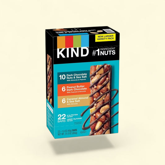 KIND dark chocolate and nut bars on a beige background