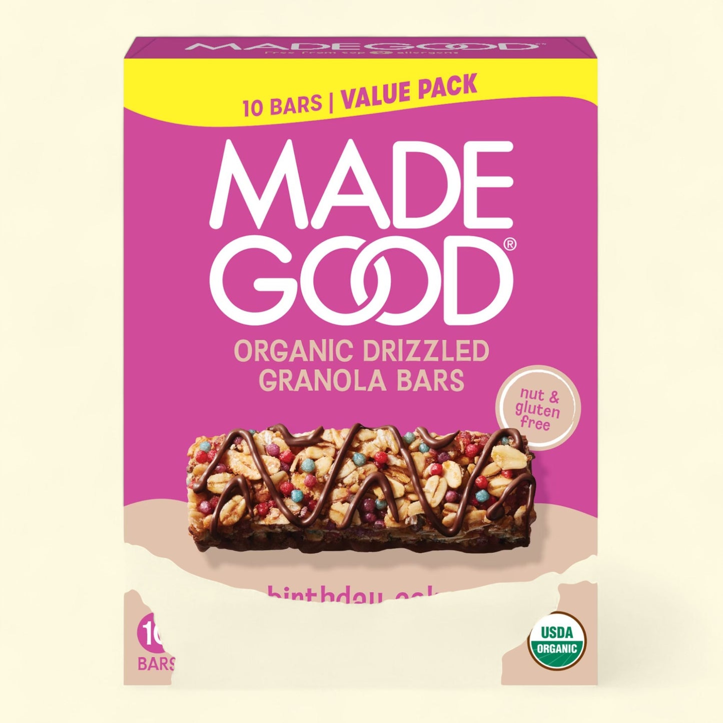 Made Good organic drizzled granola bars on a beige background