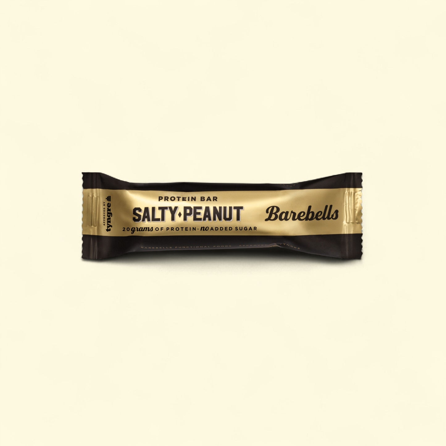 Barebells Salty Peanut protein bar on a beige