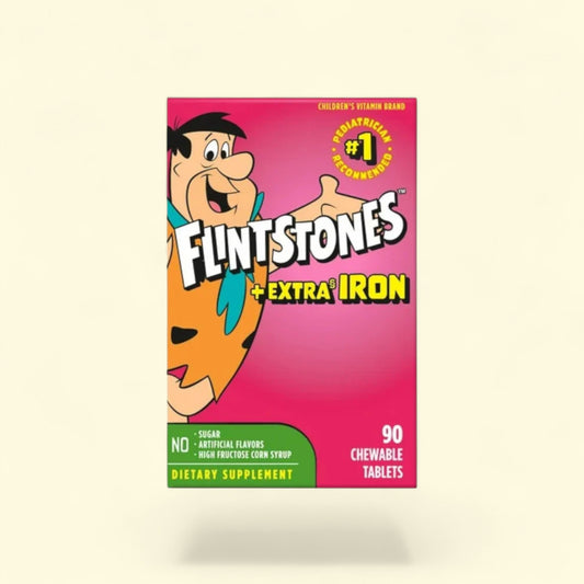Flintstones Extra Iron supplement packaging on a beige background