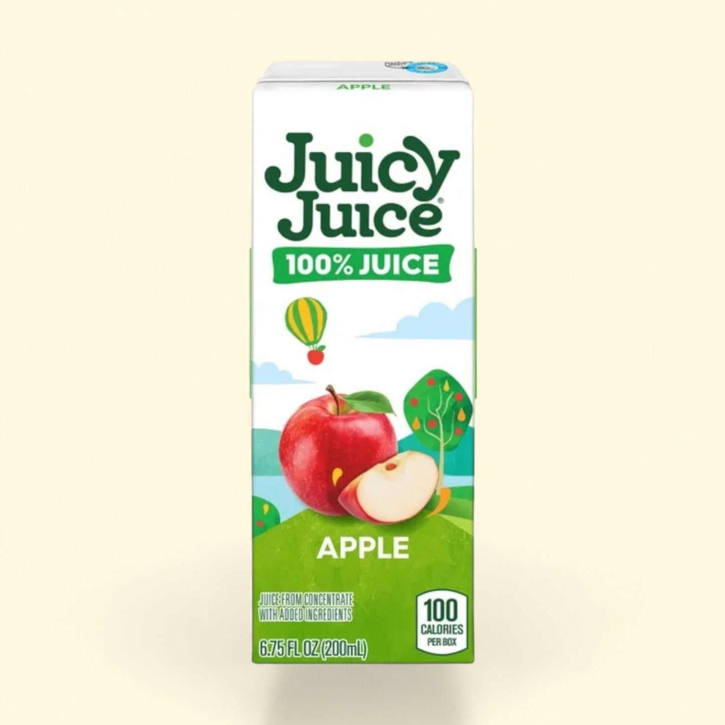 Juicy Juice apple juice box on a beige background