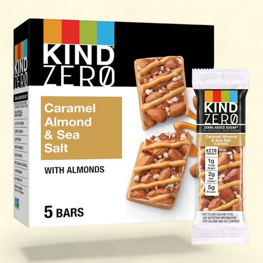 Box of Kind Zero Caramel Almond & Sea Salt bars with a single bar packaging on a beige background