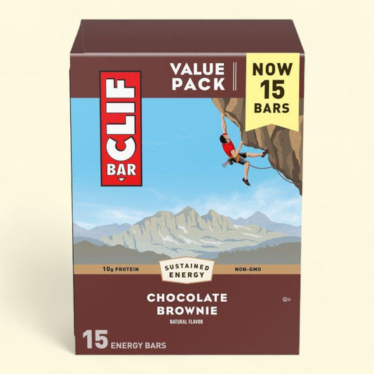 Box of Clif Bar chocolate brownie energy bars with a mountain and climber illustration on a beige background