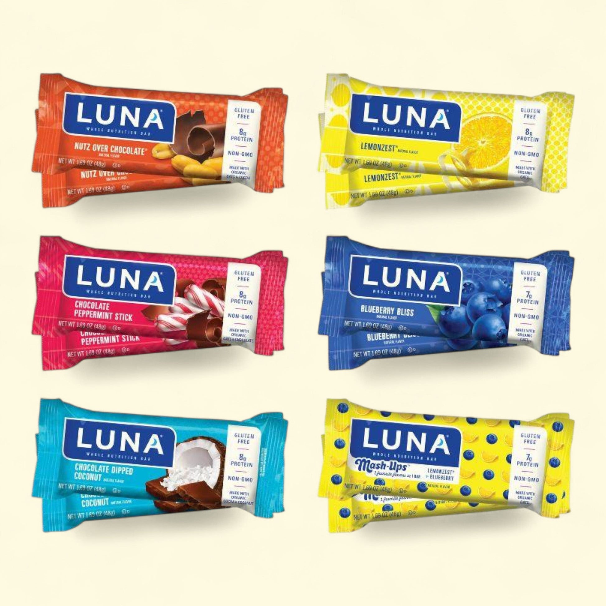 Assorted packages of Luna bars on a light background