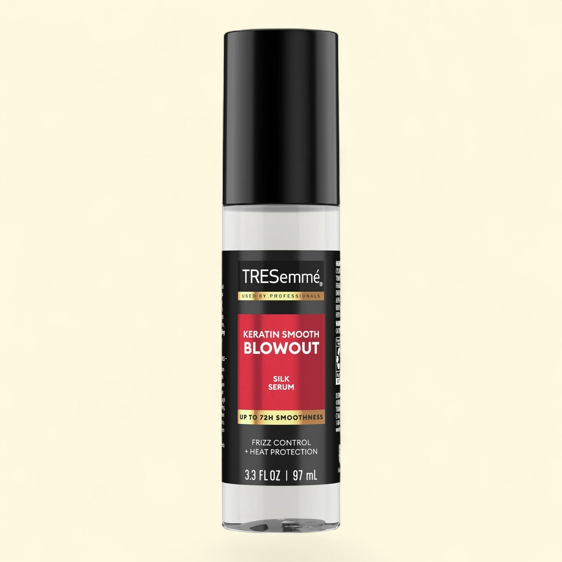 TRESemmé keratin smooth blowout silk serum bottle on a black background