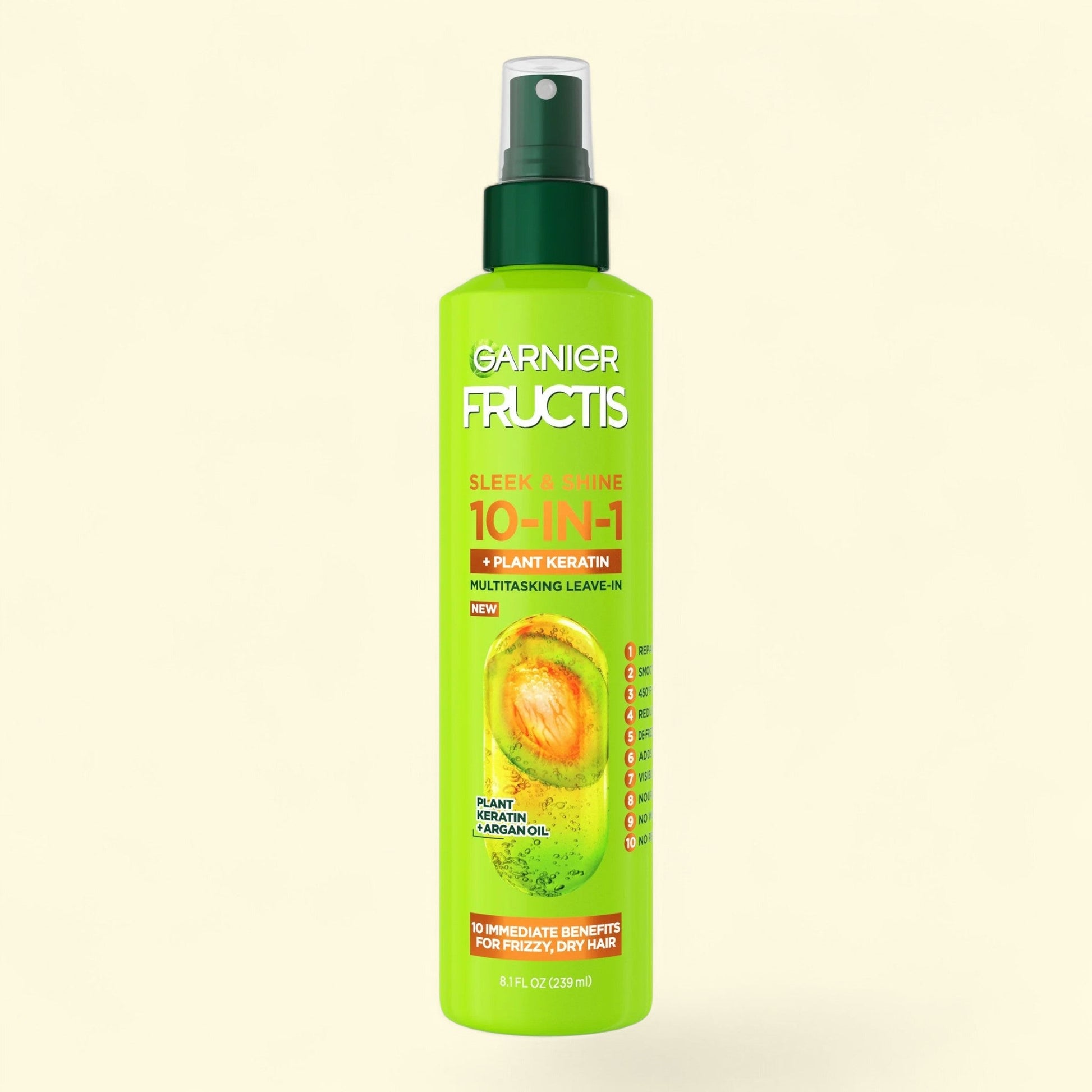 Garnier Fructis 10-in-1 hair product bottle on a light beige background