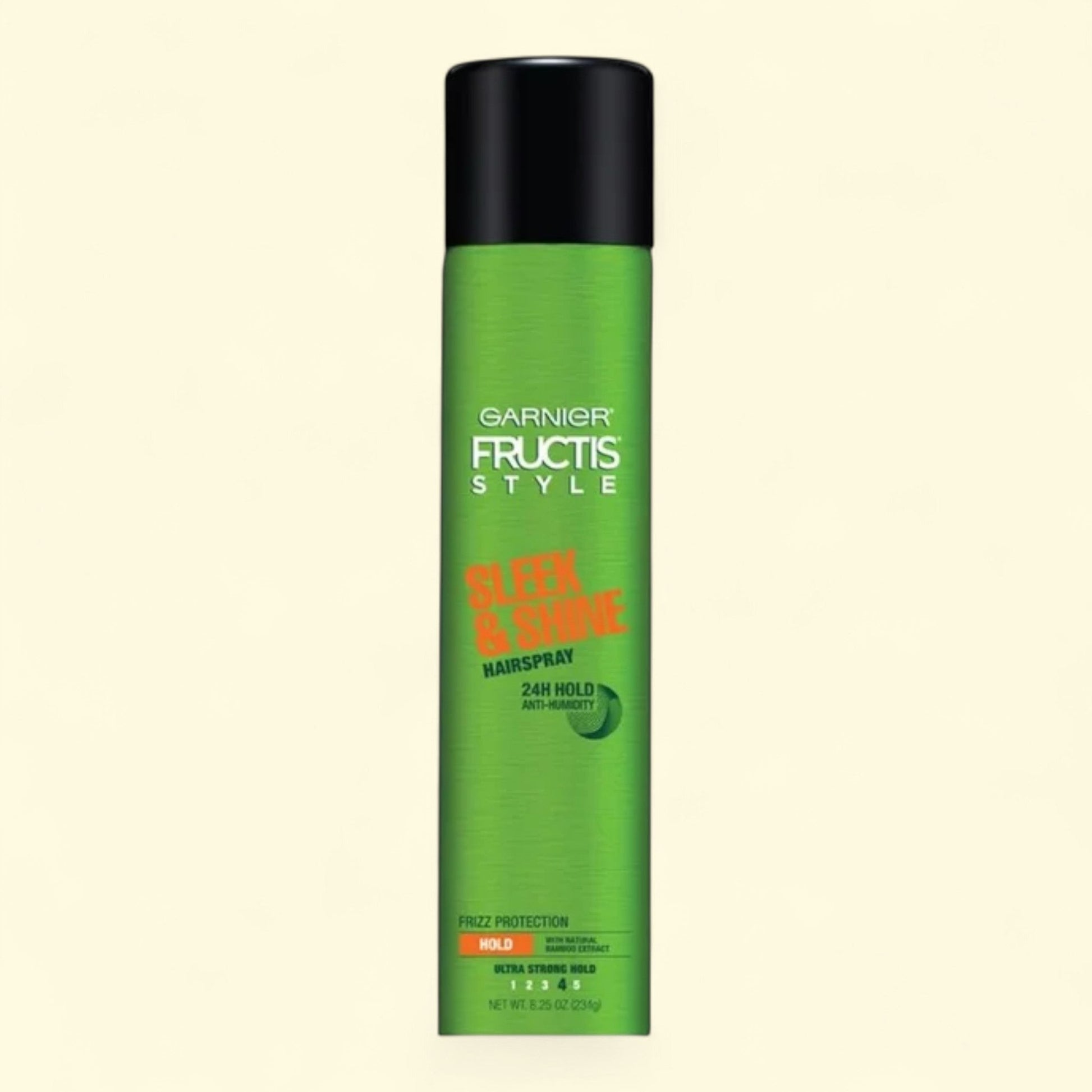 Garnier Fructis Style hairspray can on a beige background
