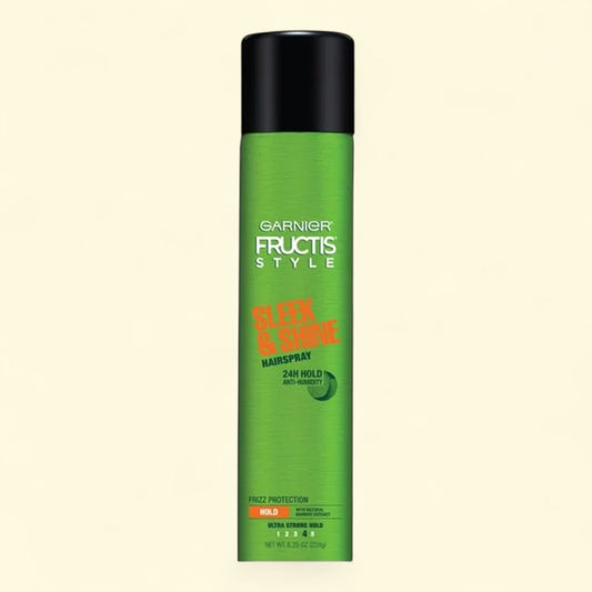 Garnier Fructis Style hairspray can on a beige background
