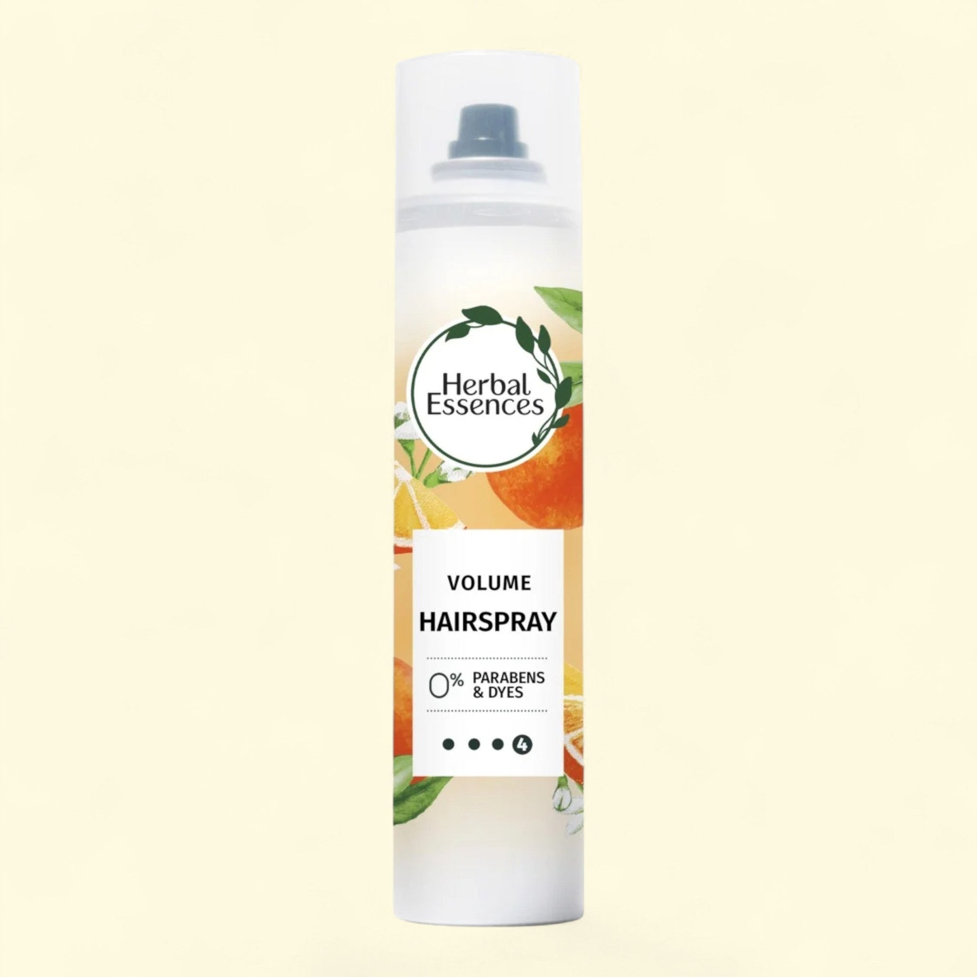 Herbal Essences volume hairspray bottle on a beige background