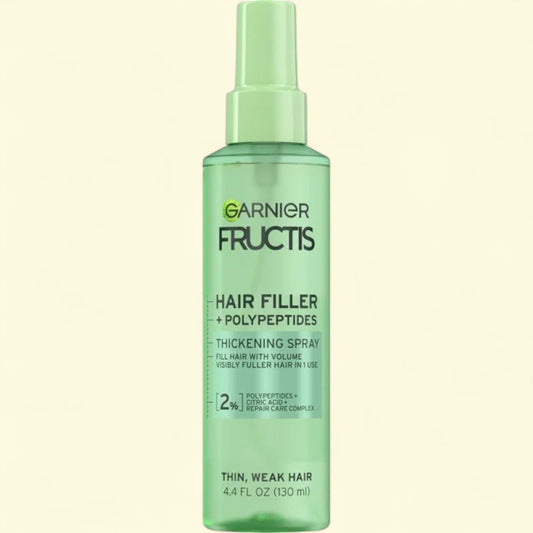 Garnier Fructis Hair Filler + Polypeptides spray bottle on a white background