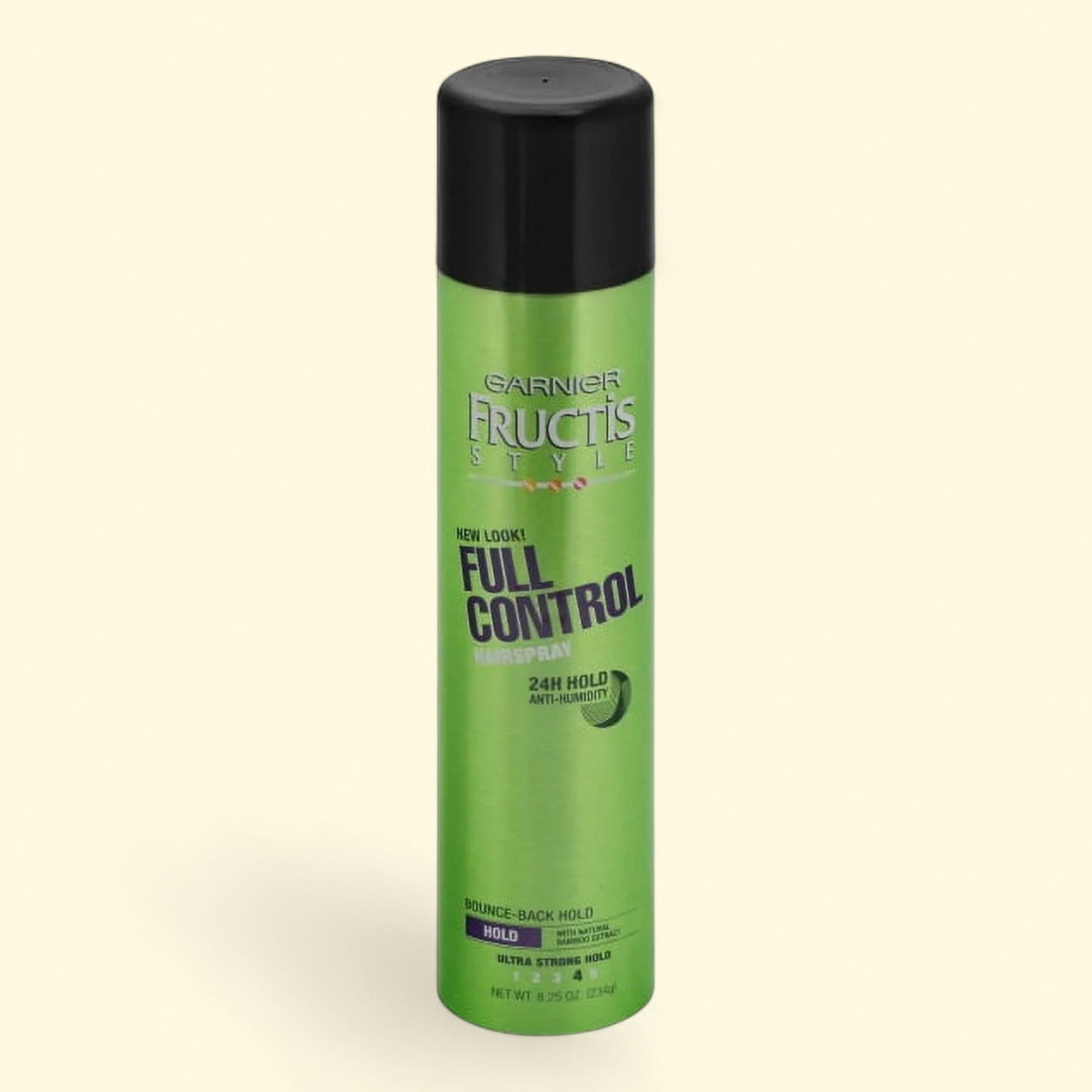 Garnier Fructis Full Control hair spray can on a beige background