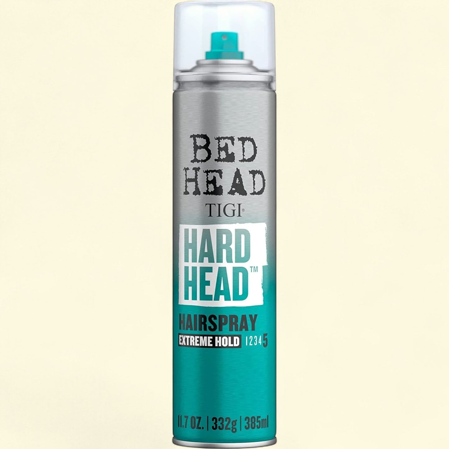 TIGI Bed Head Hard Head hairspray can on a beige background