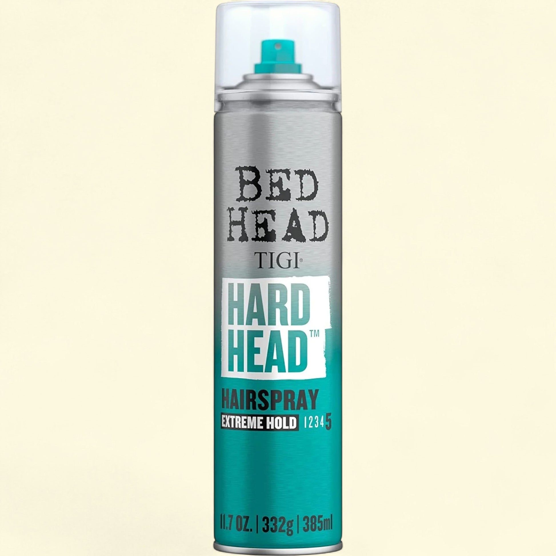 TIGI Bed Head Hard Head hairspray can on a beige background