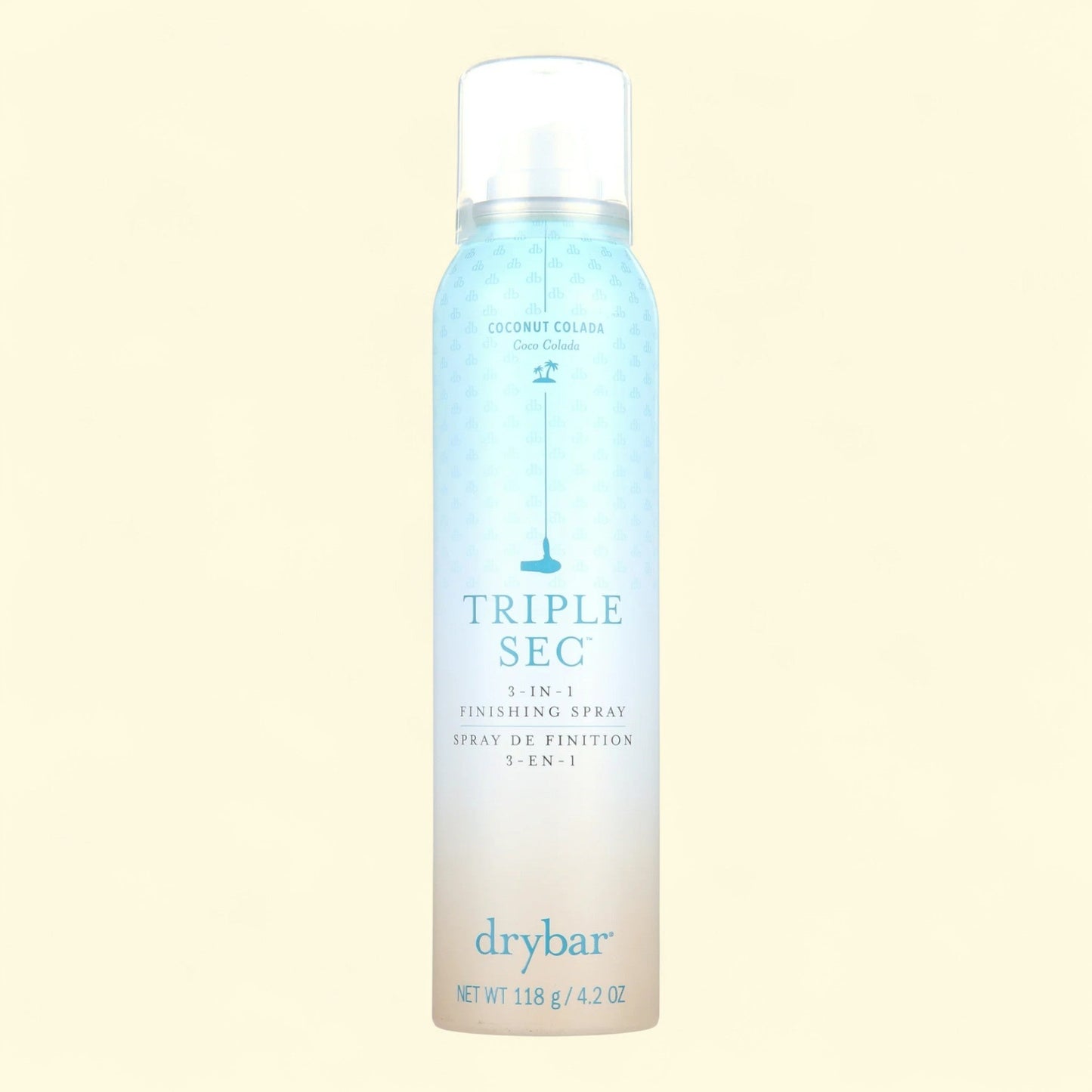 Drybar Triple Sec 3-in-1 Finishing Spray bottle on a light beige background