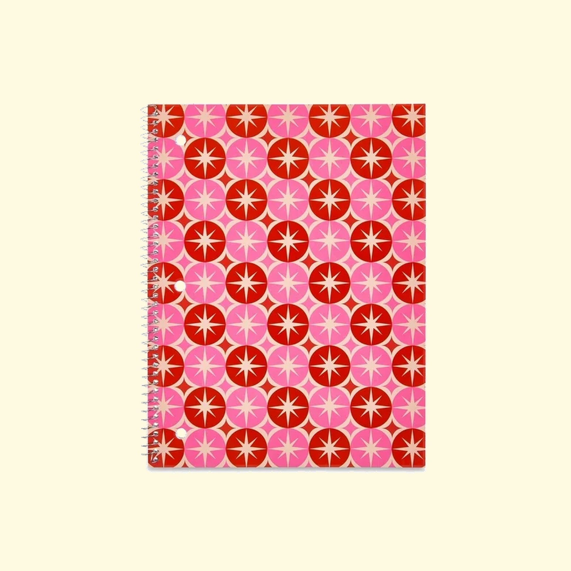 Notebook with a red and pink geometric pattern