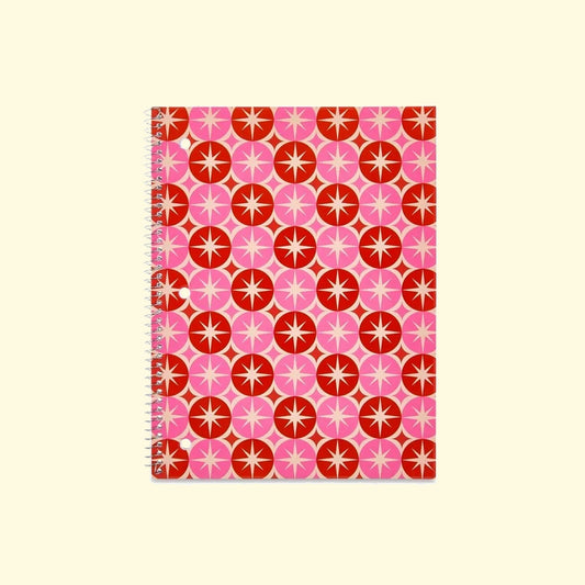 Notebook with a red and pink geometric pattern