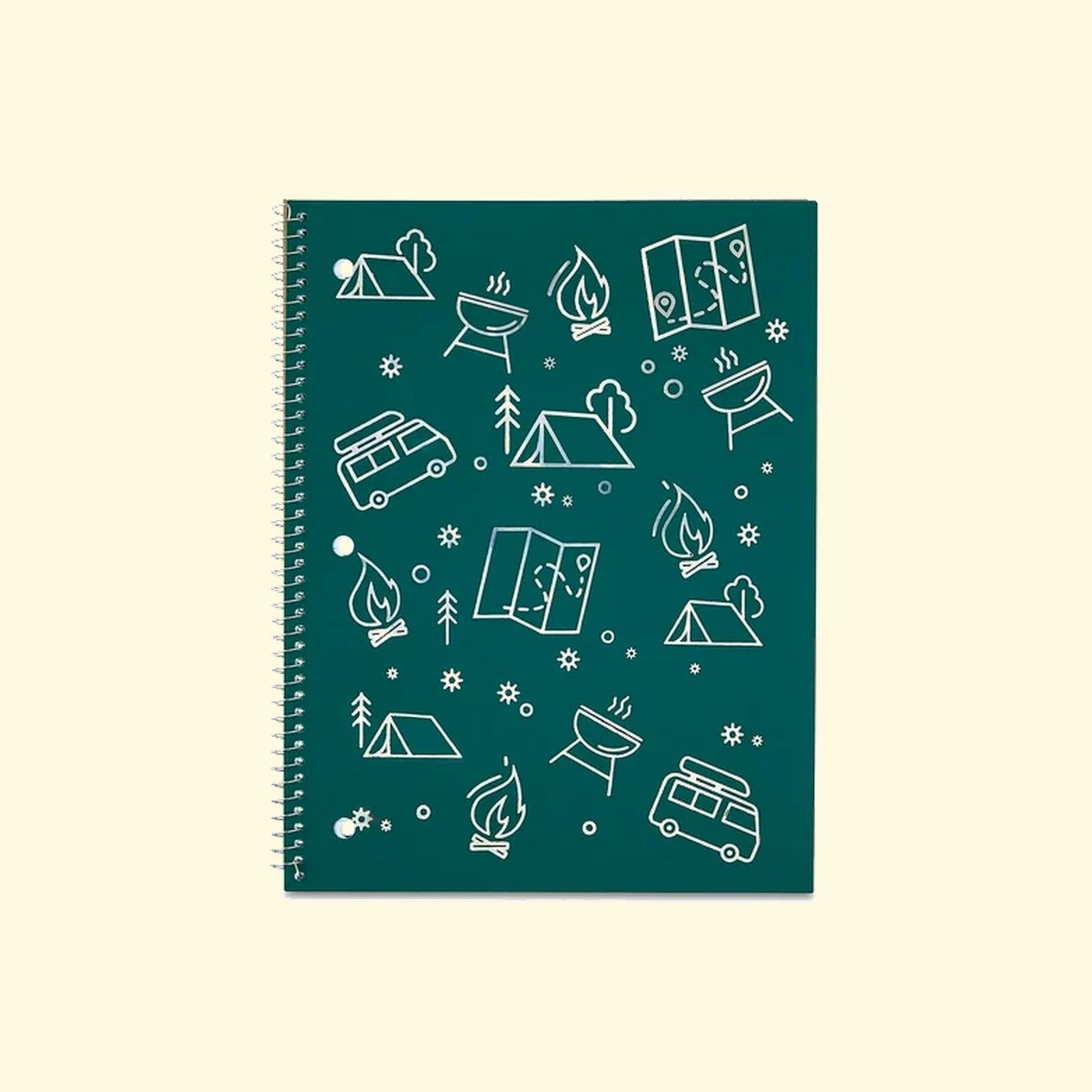 Notebook with camping-themed design on a green background