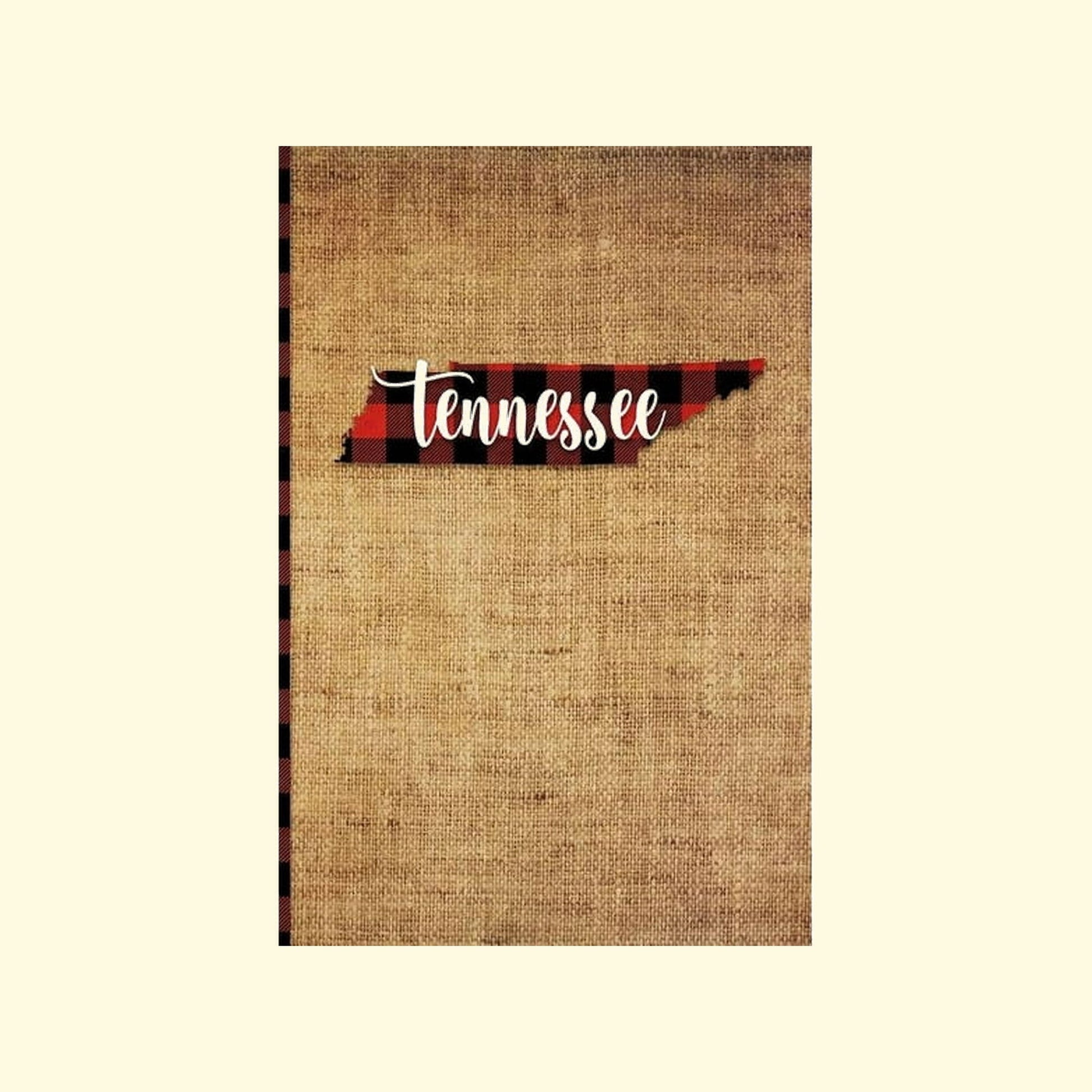 Notebook with Tennessee state outline design on a burlap texture background