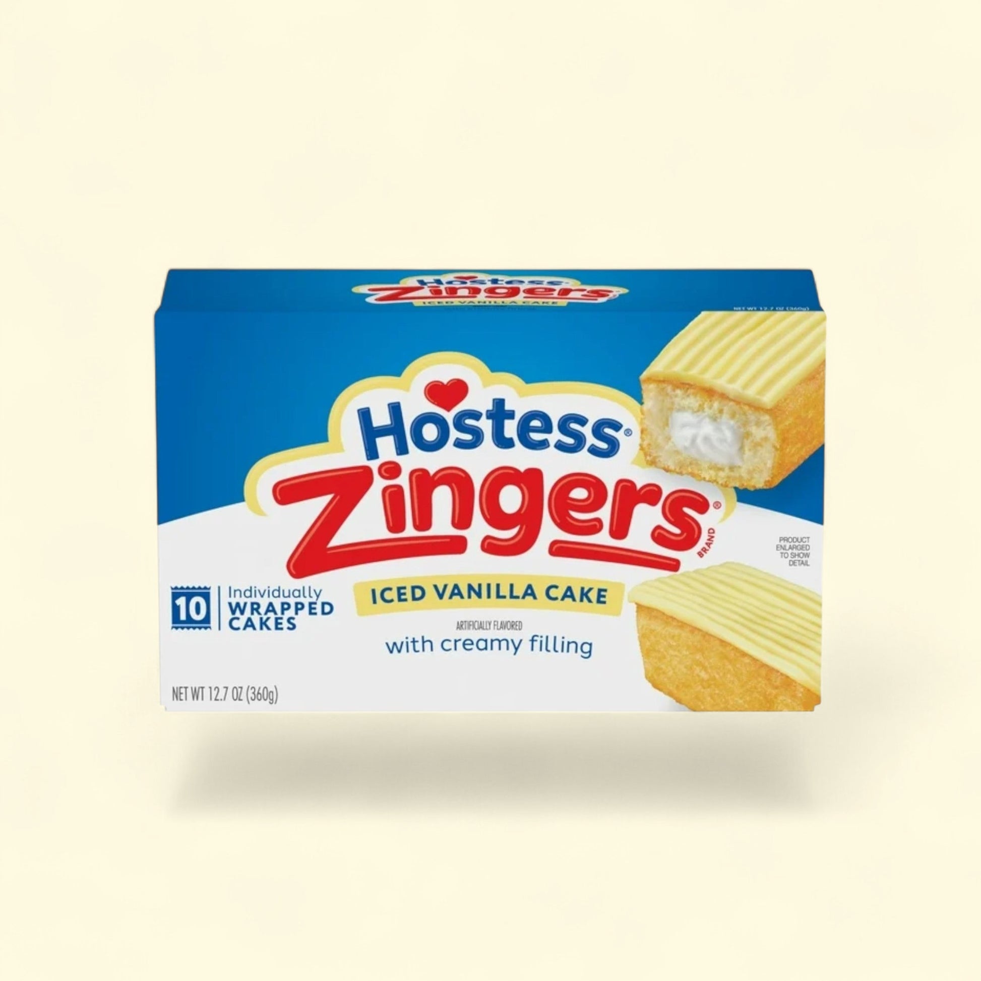 Hostess Zingers Snack Cakes, Iced Vanilla Cake, 12.7 oz (10 Ct.) — authentic US product shipped worldwide by Treatspree