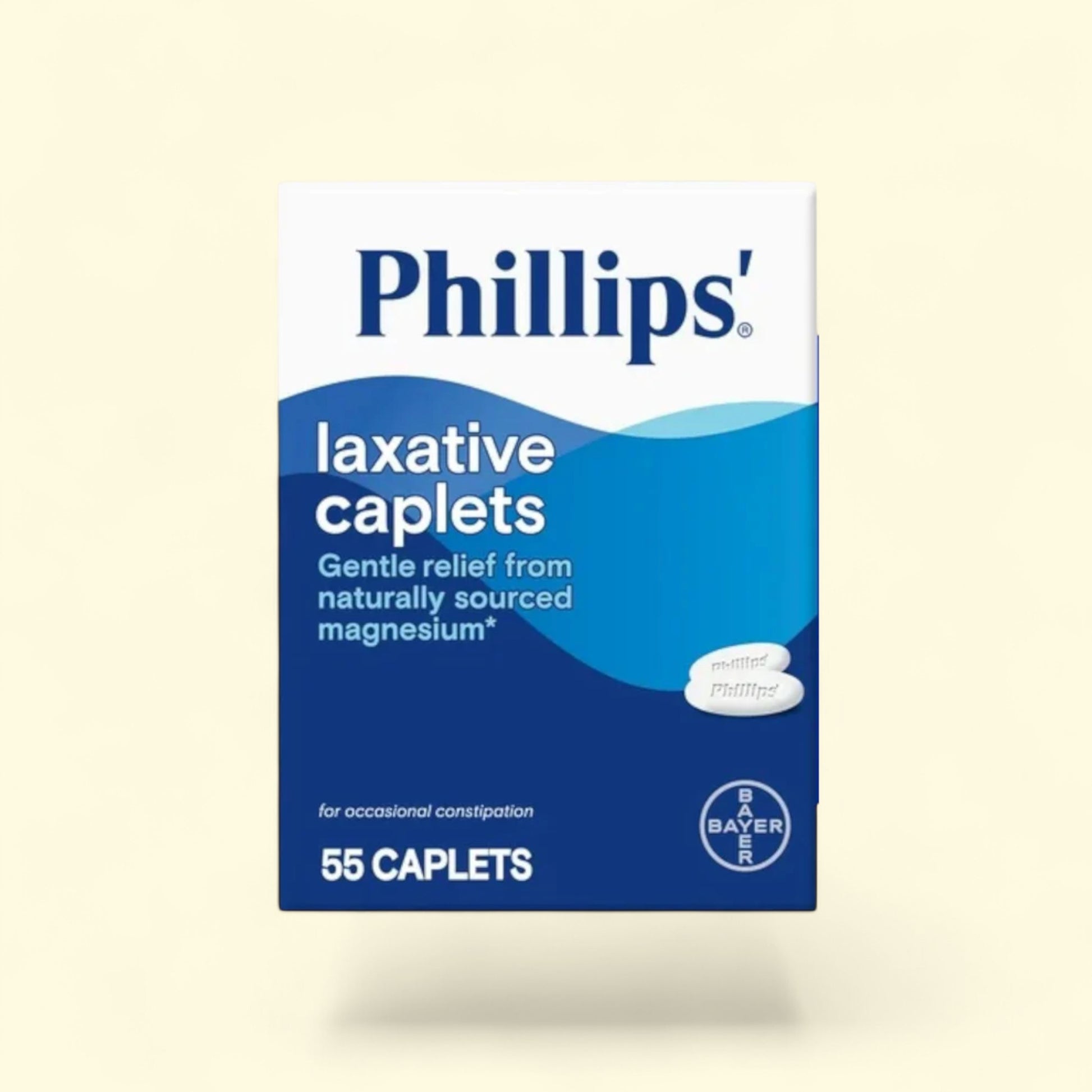 Box of Phillips laxative caplets on a beige background