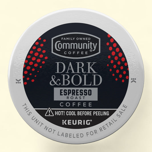 Keurig coffee pod with Community Coffee branding on a beige background